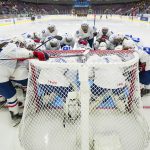 BRAMPTON, ONTARIO - APRIL 9: Team France gather in the crease of Margaux Mameri #1 prior to a game against Germany in Preliminary Round - Group B action at the 2023 IIHF Ice Hockey Women’s World Championship at CAA Centre on April 9, 2023 in Brampton, Ontario. (Photo by Andrea Cardin/IIHF)