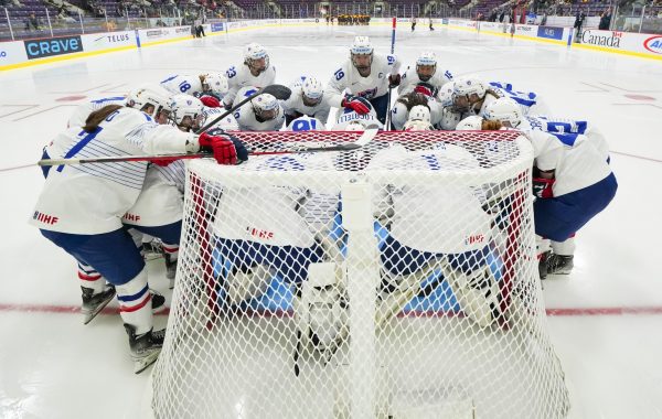 BRAMPTON, ONTARIO - APRIL 9: Team France gather in the crease of Margaux Mameri #1 prior to a game against Germany in Preliminary Round - Group B action at the 2023 IIHF Ice Hockey Women’s World Championship at CAA Centre on April 9, 2023 in Brampton, Ontario. (Photo by Andrea Cardin/IIHF)