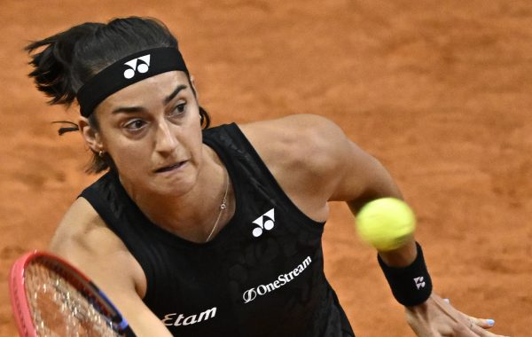 (FILES) France's Caroline Garcia returns the ball to Egypt's Mayar Sherif during their 2023 WTA Tour Madrid Open tennis tournament singles match at the Caja Magica in Madrid on April 29, 2023. - France's number one player France's Caroline Garcia, in the 5th position of the WTA rankings, will take part in the Roland-Garros Open tennis tournament 2023.