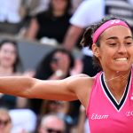 France's Caroline Garcia jumps as she celebrates her victory over China's Wang Xiyu during their women's singles match on day two of the Roland-Garros Open tennis tournament at the Court Philippe-Chatrier in Paris