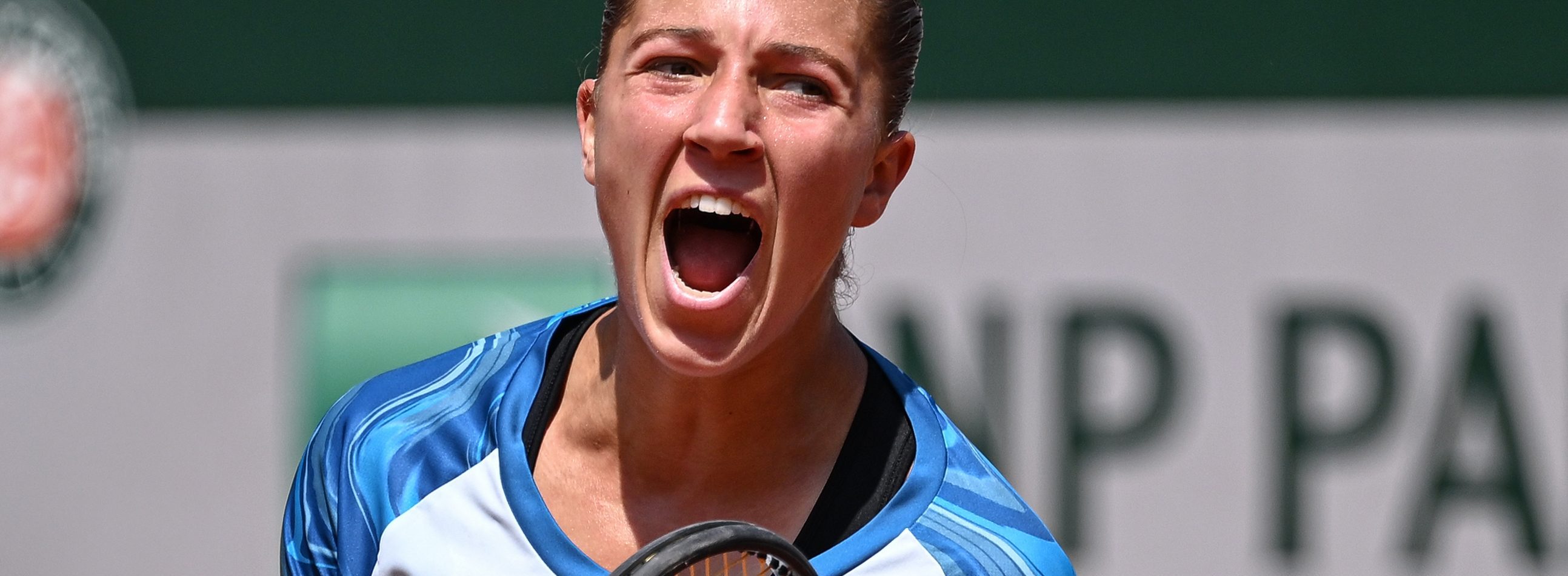 France's Diane Parry celebrates after winning against Ukraine's Anhelina Kalinina at the end of their women's singles match on day three of the Roland-Garros Open tennis tournament at the Court Simonne-Mathieu in Paris on May 30