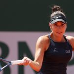 PARIS, FRANCE - MAY 30: Oceane Dodin of France plays a forehand against Selena Janicijevic of France during their Women's Singles First Round Match on Day Three of the 2023 French Open at Roland Garros on May 30, 2023 in Paris, France.